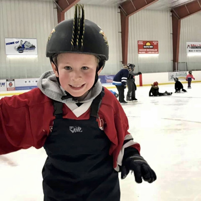 A student on the ice during learn to skate